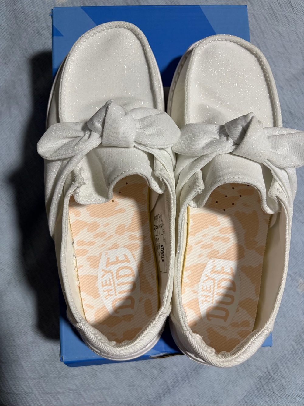 Kids size 5 that fits women’s size 7 cute white glitter hey dudes barely worn.